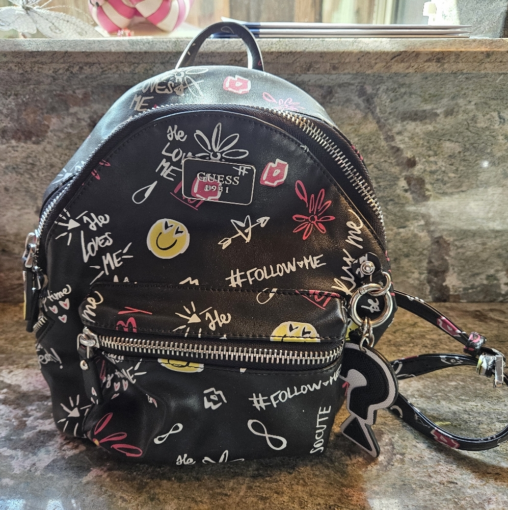 Authentic GUESS Cool School Black Printed Small Backpack (Looks Brand New)